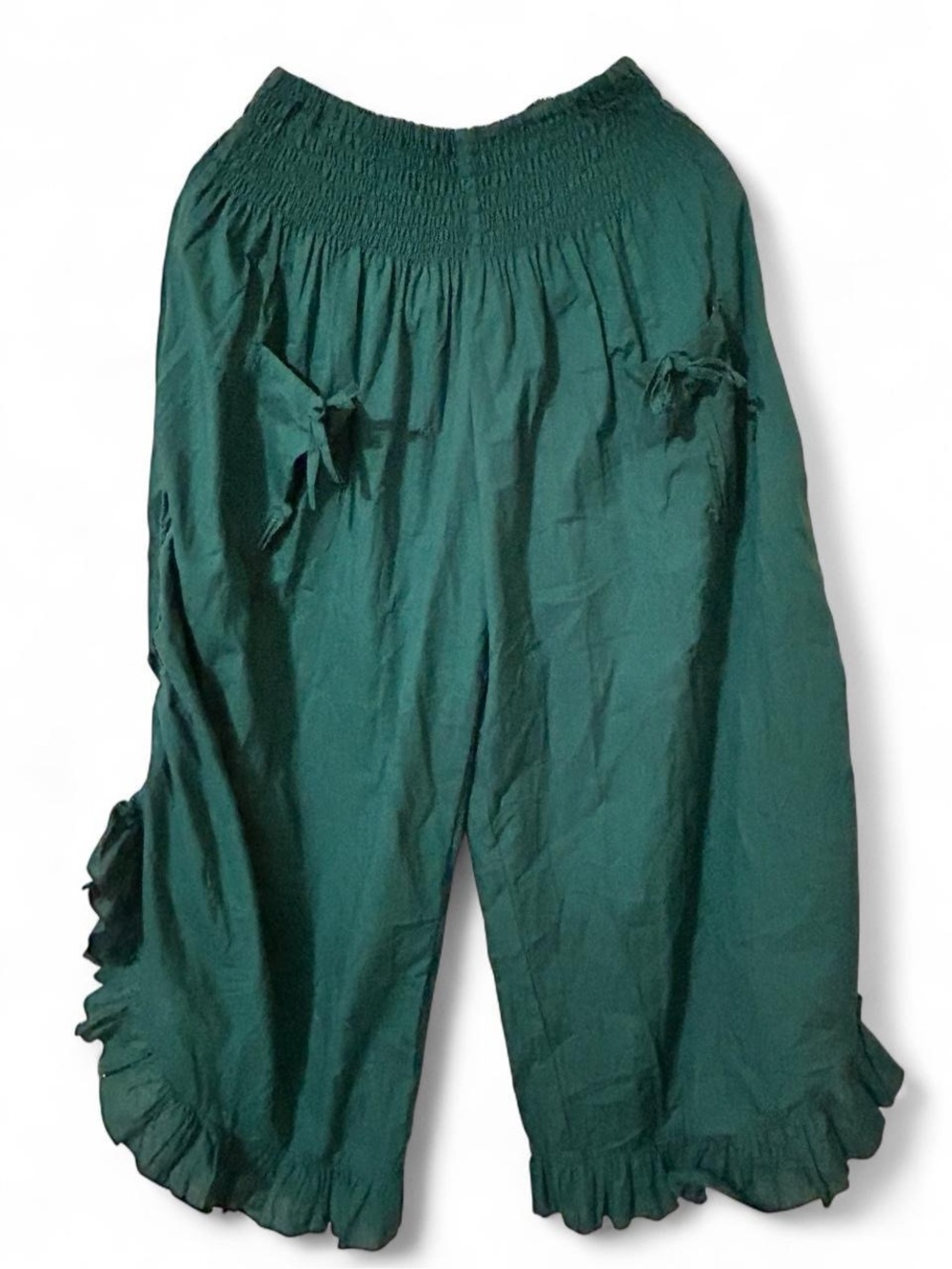 Wild women green smocked top with ruffle sleeves and tie detail. Size S/M